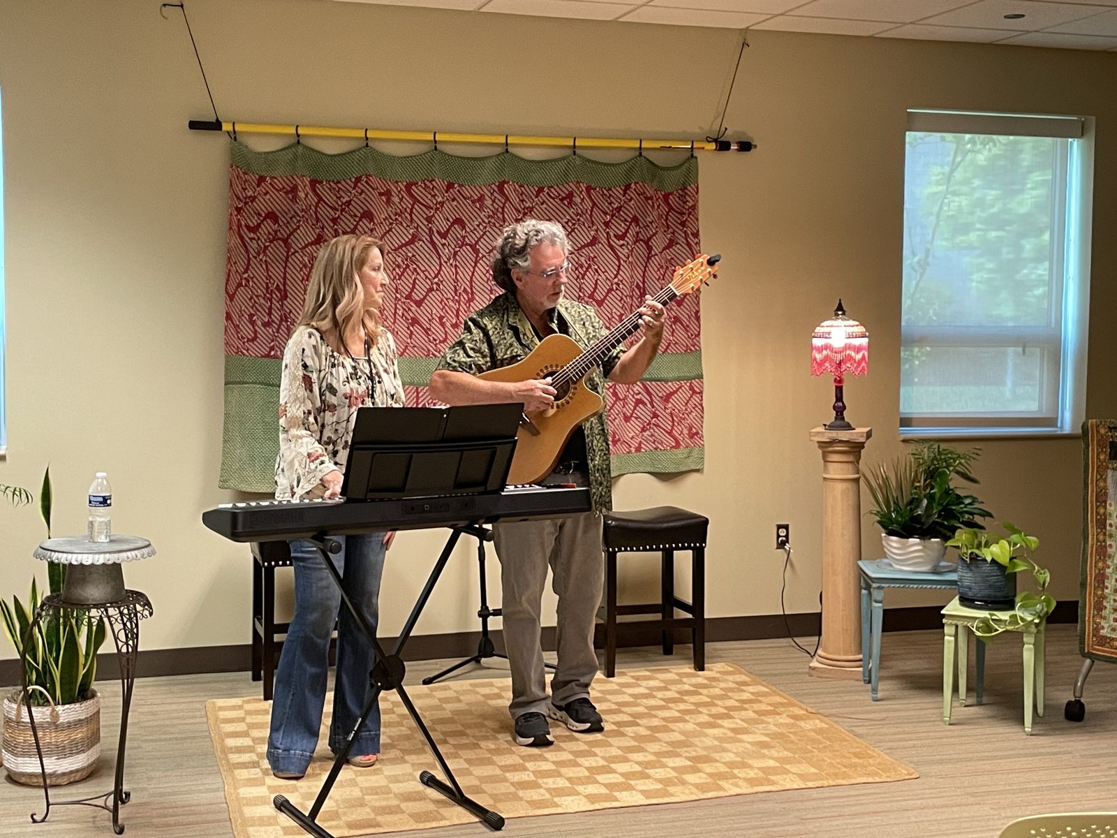 A duo performing in a private showcase room